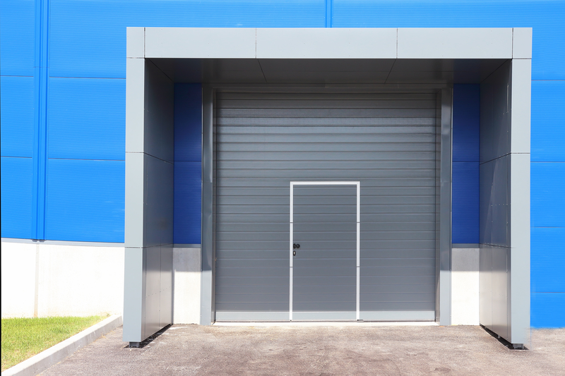 Roller shutter door of logistic center for industrial background transport company.